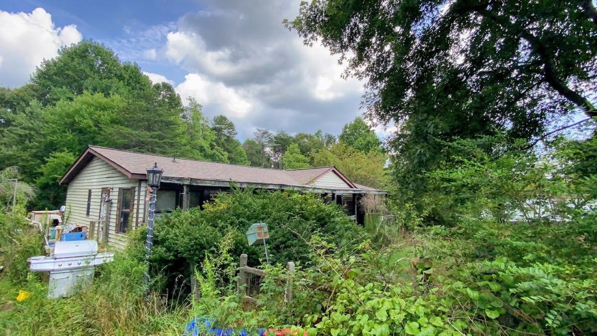 Overgrown property purchased as-is in Troutman, NC